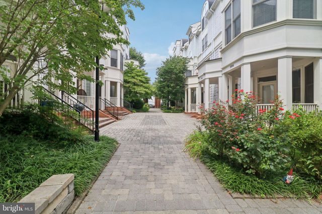 a view of a building with a yard