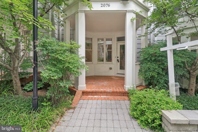 a view of a pathway with a house