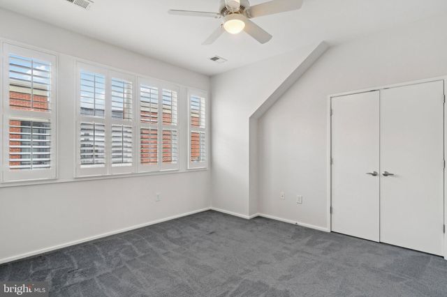 a bathroom with a sink a mirror and shower