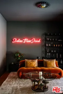 a outdoor living space with furniture and a potted plant