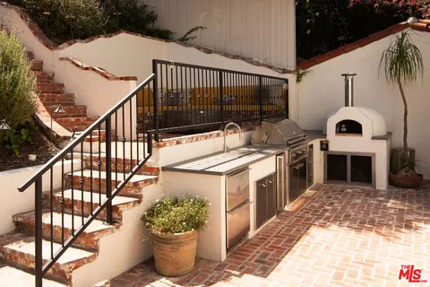 a view of a porch with furniture
