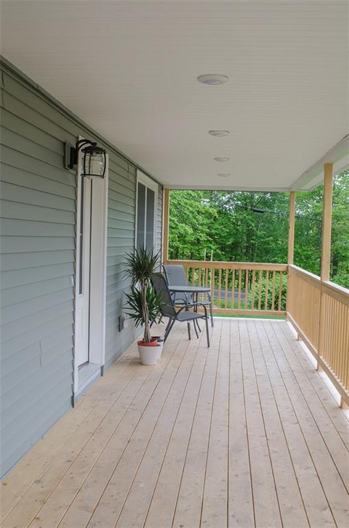6 Burgess Farm Road Freeport, ME 04032 - Photo 6 of 35 Farmer's porch overlooks the yard.