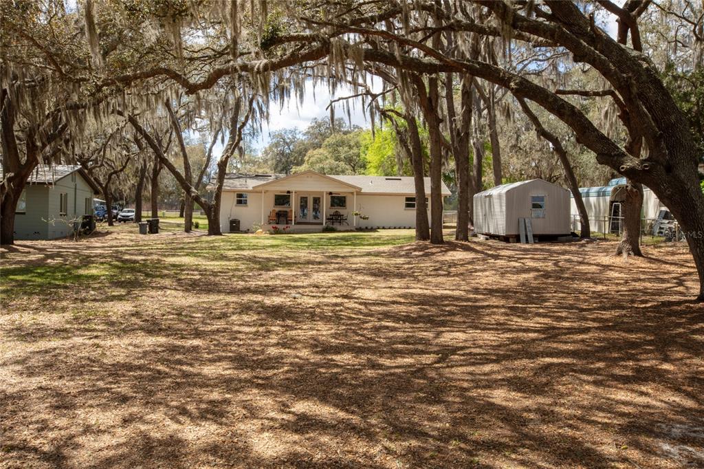 5921 County Road 352 Keystone Heights, FL 32656 - Photo 20 of 73 a front view of a house with a yard