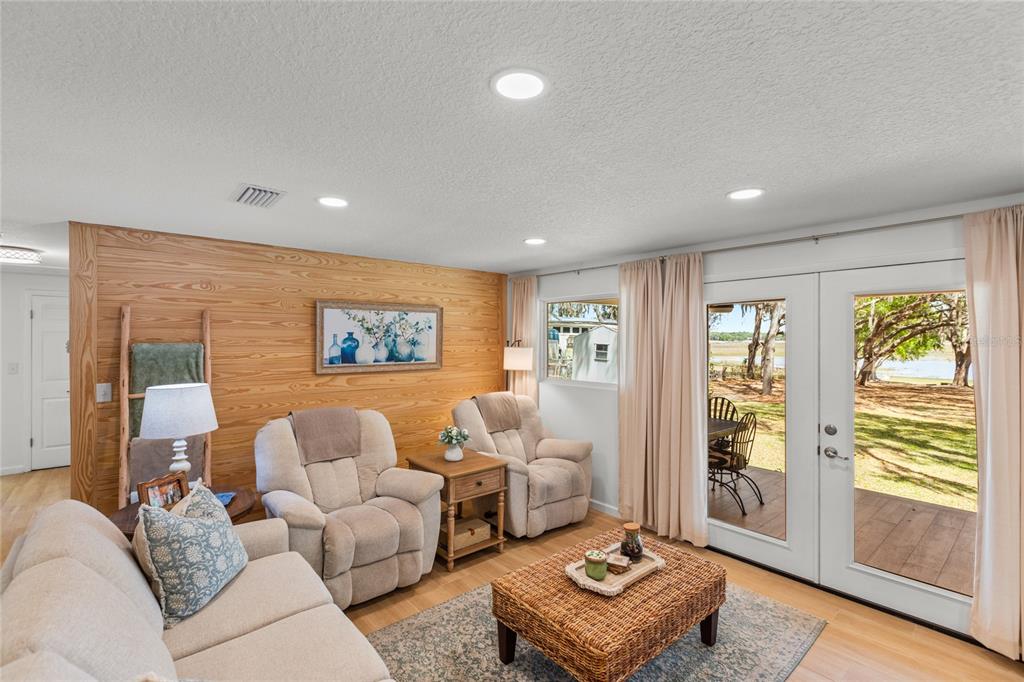 5921 County Road 352 Keystone Heights, FL 32656 - Photo 41 of 73 a living room with furniture and a window