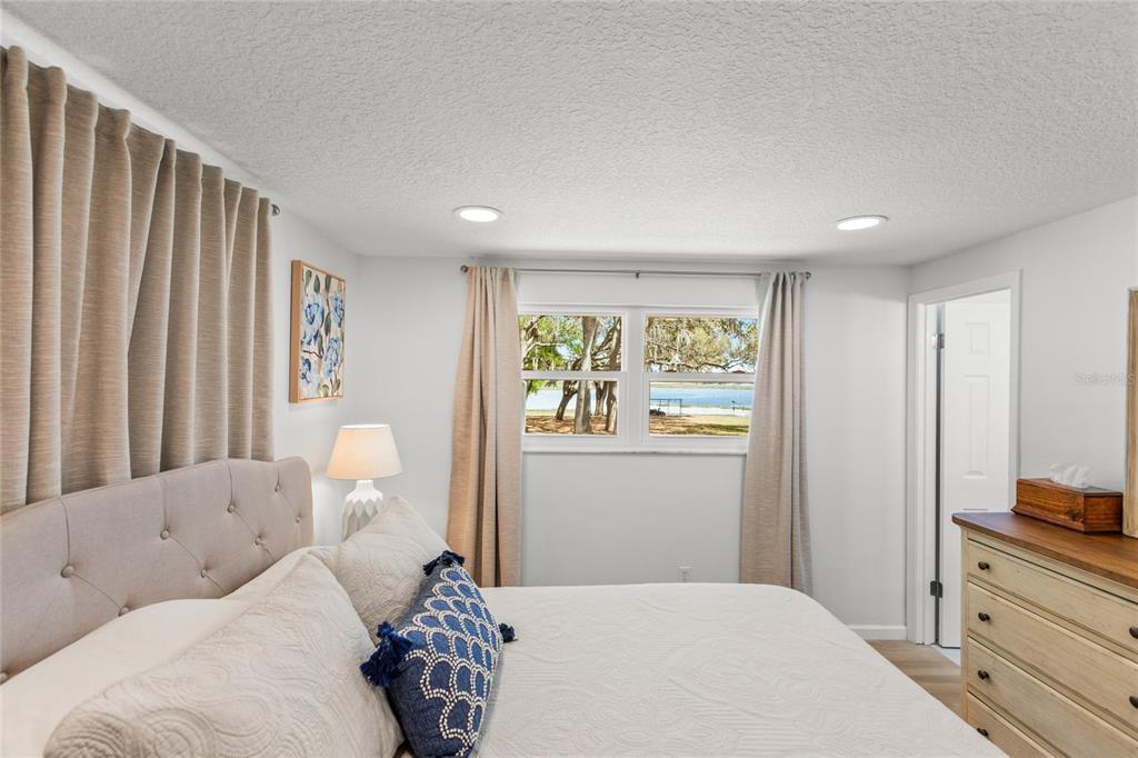 5921 County Road 352 Keystone Heights, FL 32656 - Photo 52 of 73 a bedroom with a large bed and a window