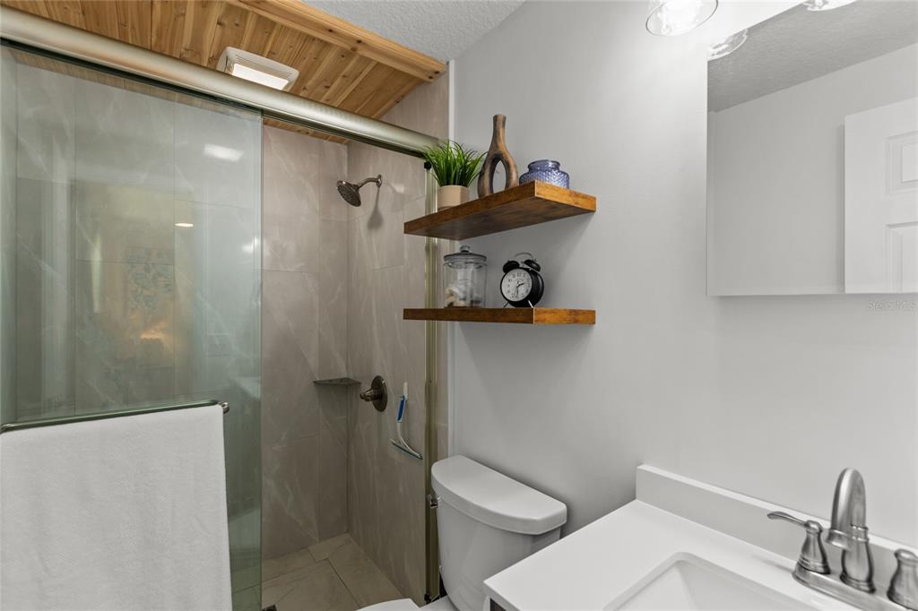 5921 County Road 352 Keystone Heights, FL 32656 - Photo 54 of 73 a bathroom with a toilet and a sink