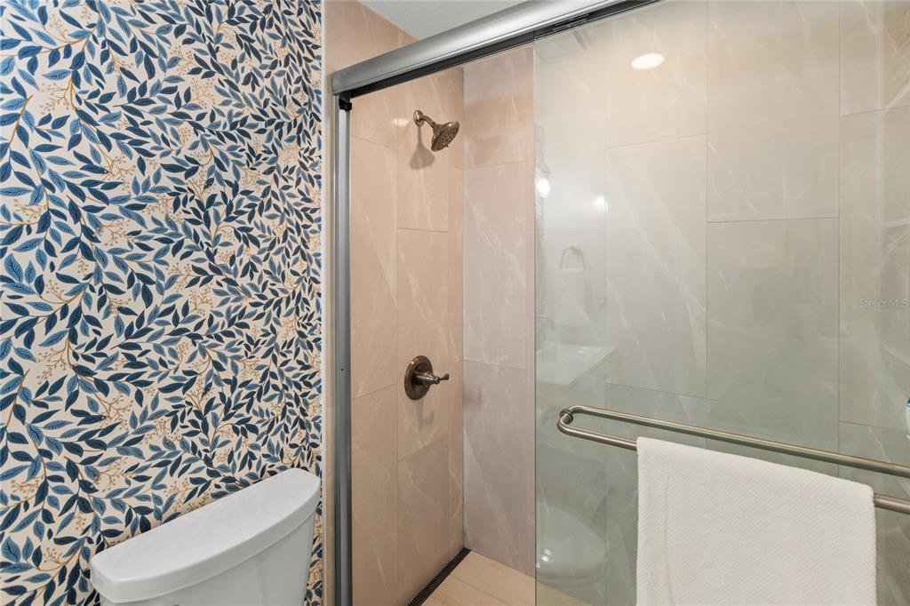 5921 County Road 352 Keystone Heights, FL 32656 - Photo 61 of 73 a bathroom with a shower and a toilet