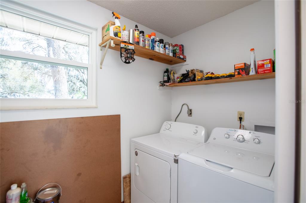 5921 County Road 352 Keystone Heights, FL 32656 - Photo 64 of 73 a utility room with dryer and washer