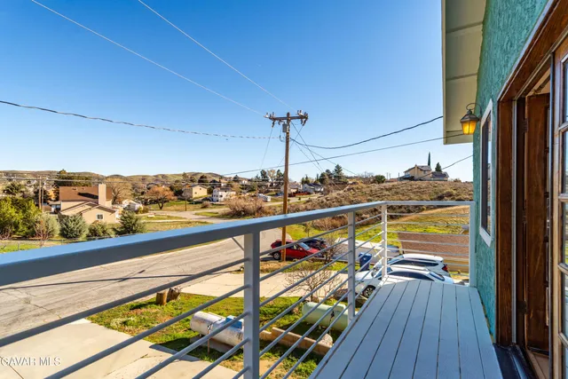 a view of ocean from a balcony
