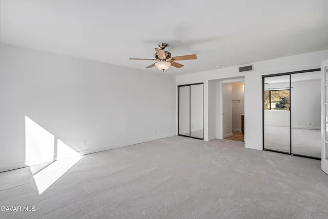 a bathroom with a sink toilet and vanity