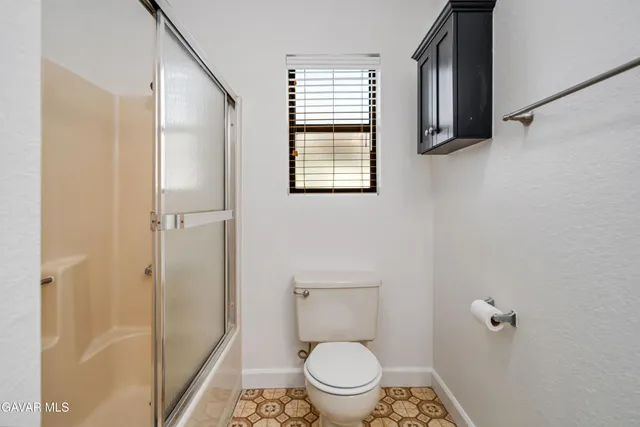 a view of a pathway both side of a road with a yard