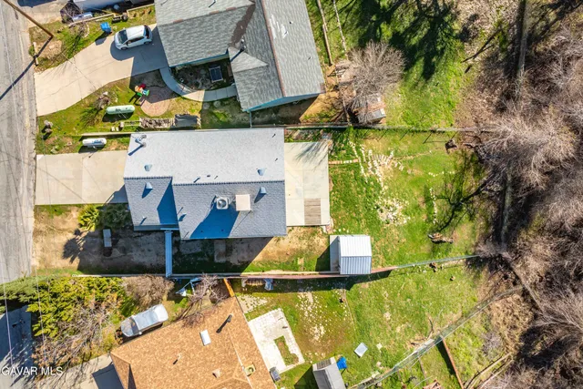 a view of a city with mountains in the background