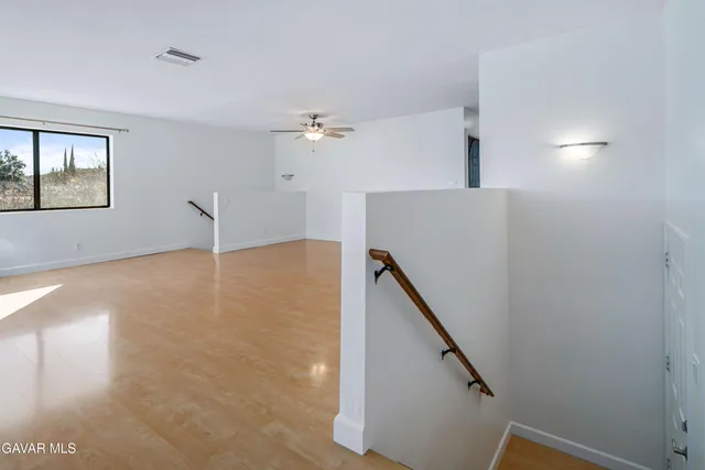 a view of a hallway with entryway