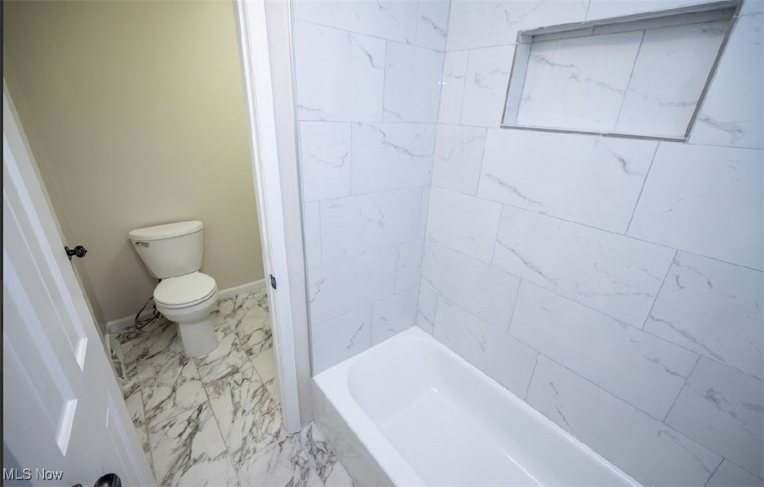6006 Tippecanoe Road Canfield, OH 44406 - Photo 18 of 35 Bathroom with marble finish floors, toilet, and baseboards