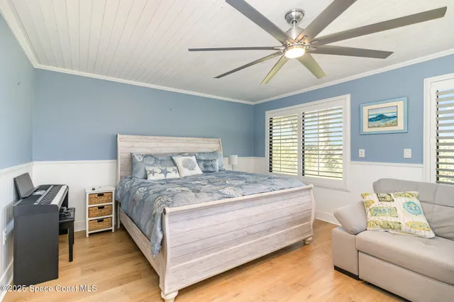 a bed room with a bed and a couch