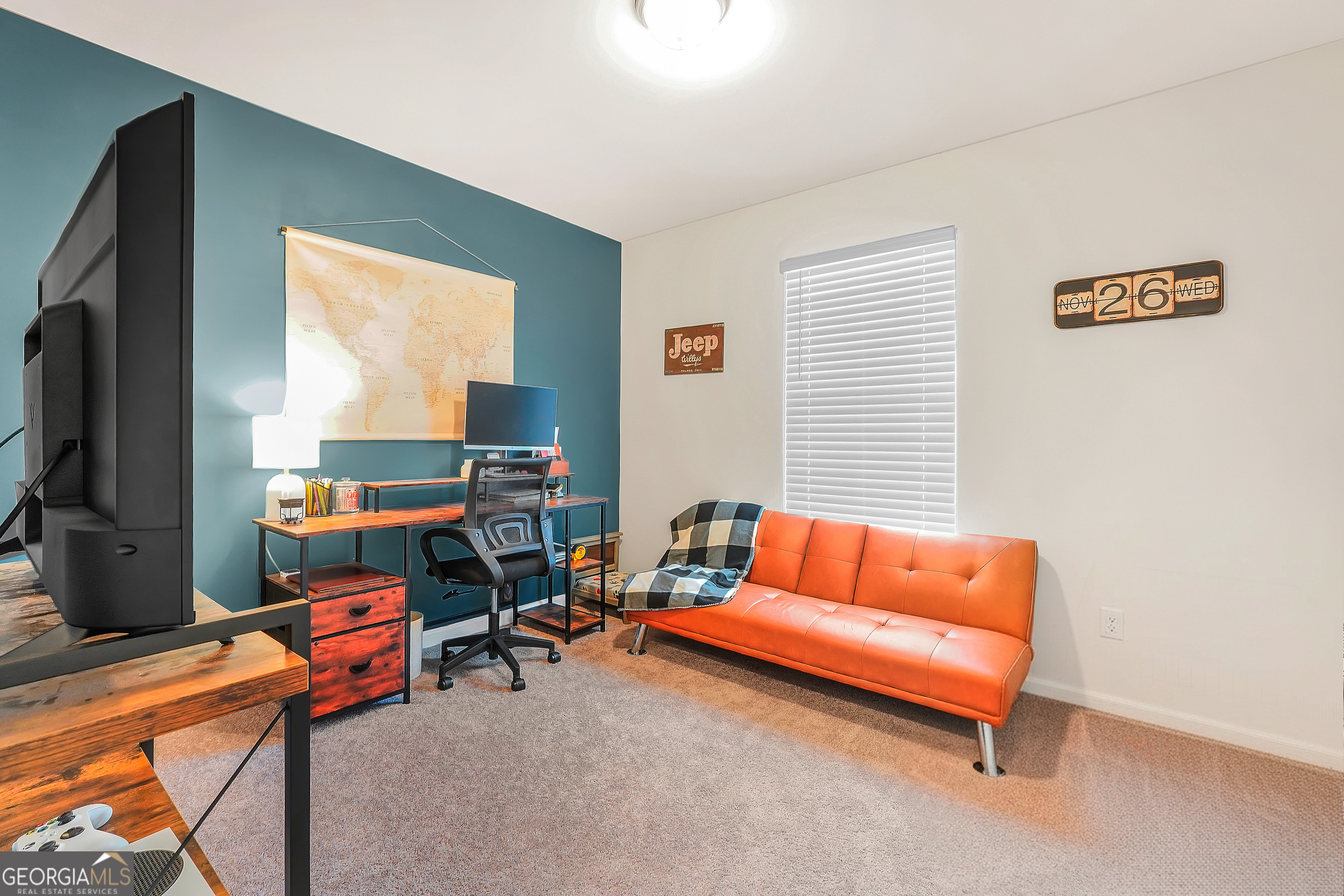 135 Catalpa Road Milner, GA 30257 - Photo 29 of 29 a room with furniture and a window