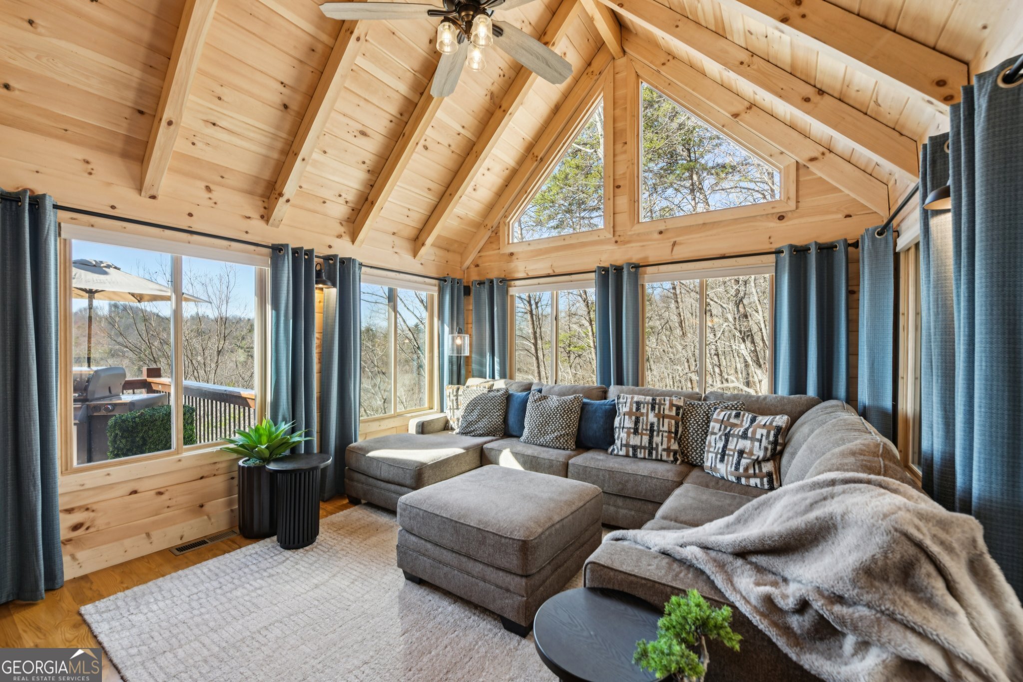 232 Ranch Mountain Drive Dahlonega, GA 30533 - Photo 14 of 78 a living room with furniture and large windows