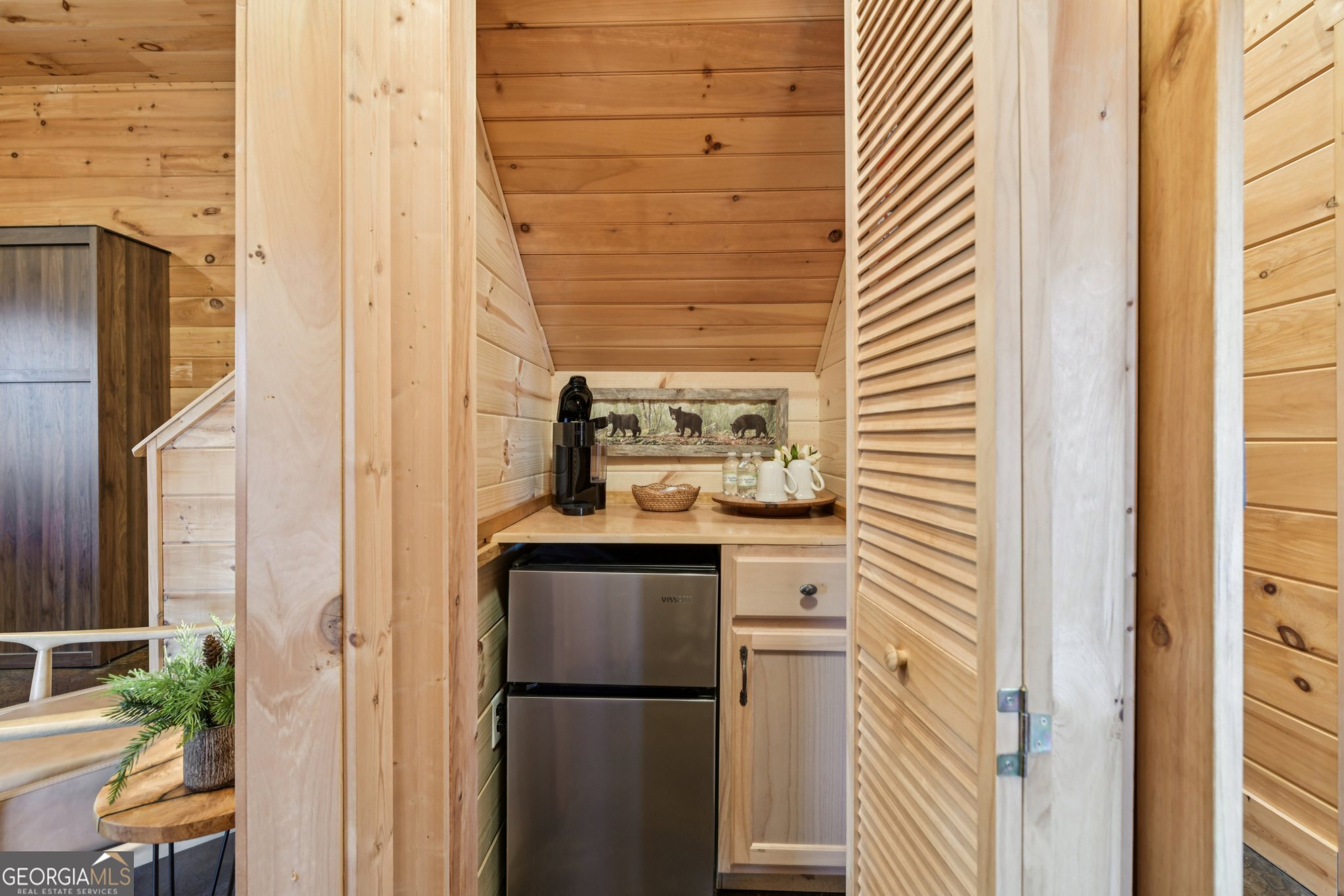 232 Ranch Mountain Drive Dahlonega, GA 30533 - Photo 41 of 78 a close view of a utility room with dryer and door