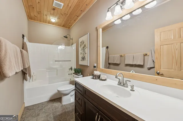 a view of a city with tall trees