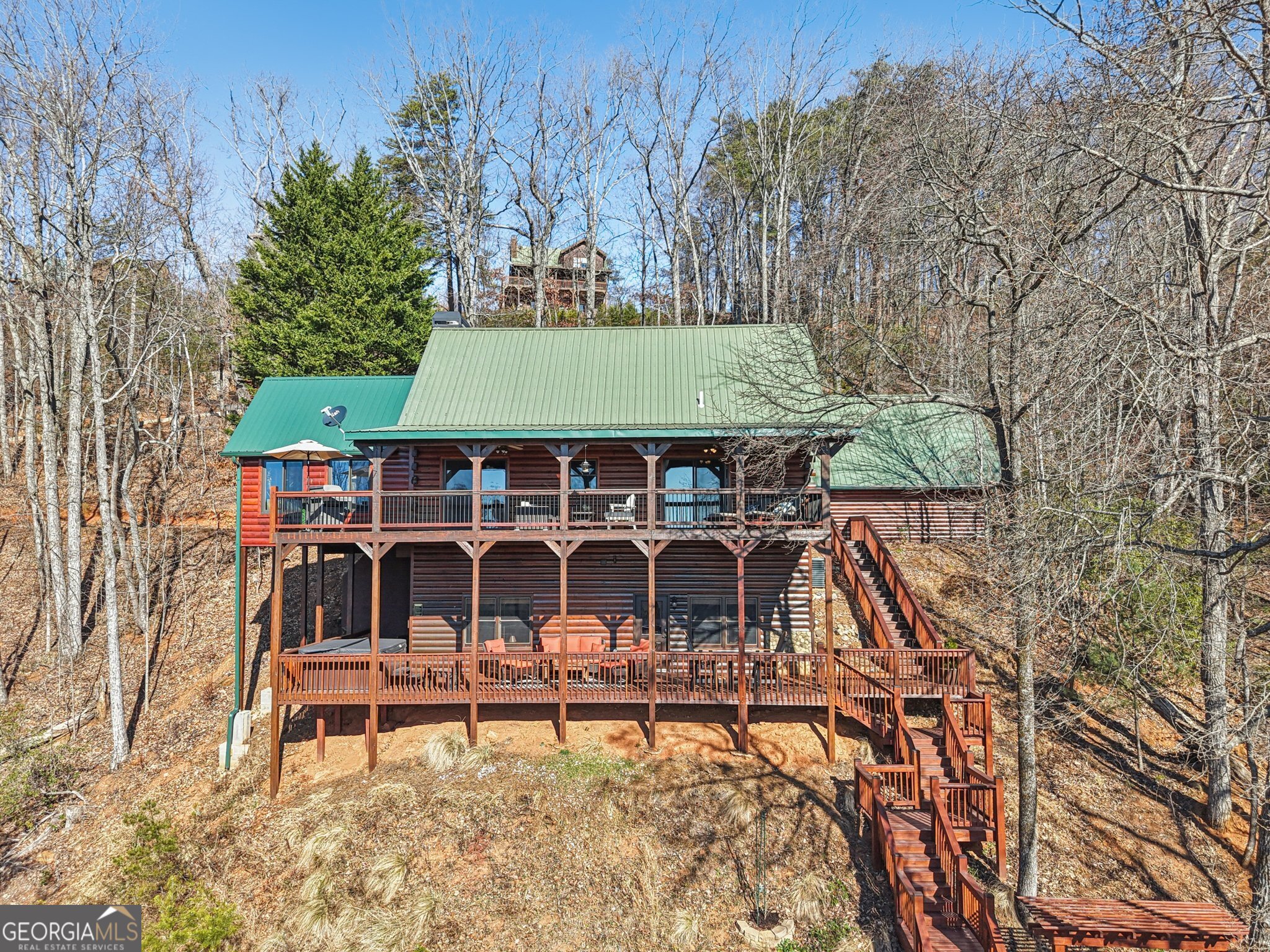 232 Ranch Mountain Drive Dahlonega, GA 30533 - Photo 64 of 78 a view of a chairs and table in the patio