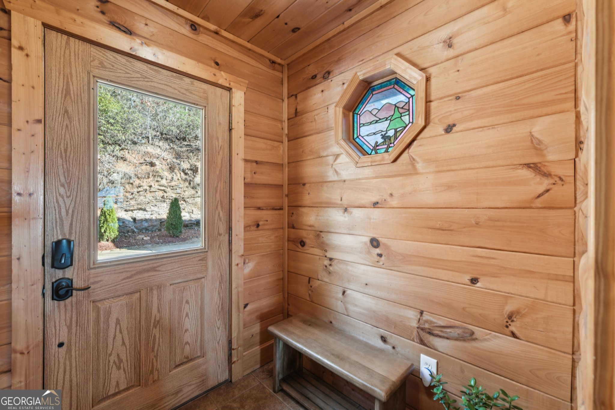 232 Ranch Mountain Drive Dahlonega, GA 30533 - Photo 8 of 78 a bathroom with a toilet and a window