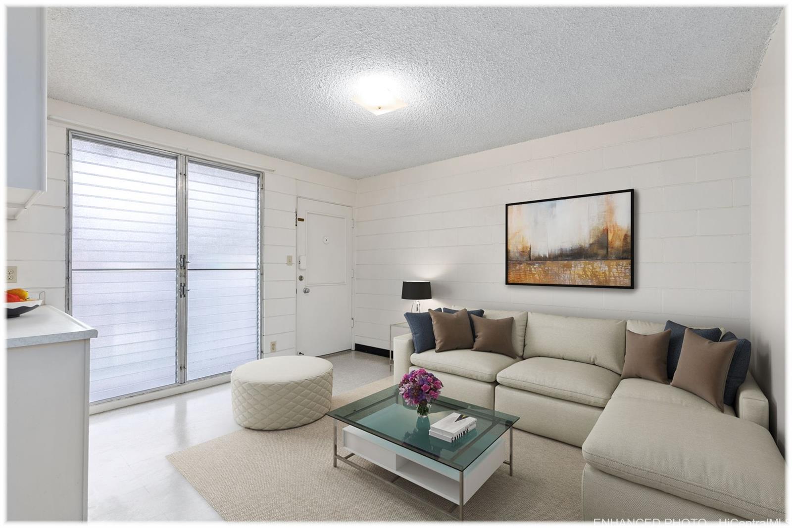1254 Lunalilo Street Honolulu, HI 96822 - Photo 4 of 13 a living room with furniture and a window