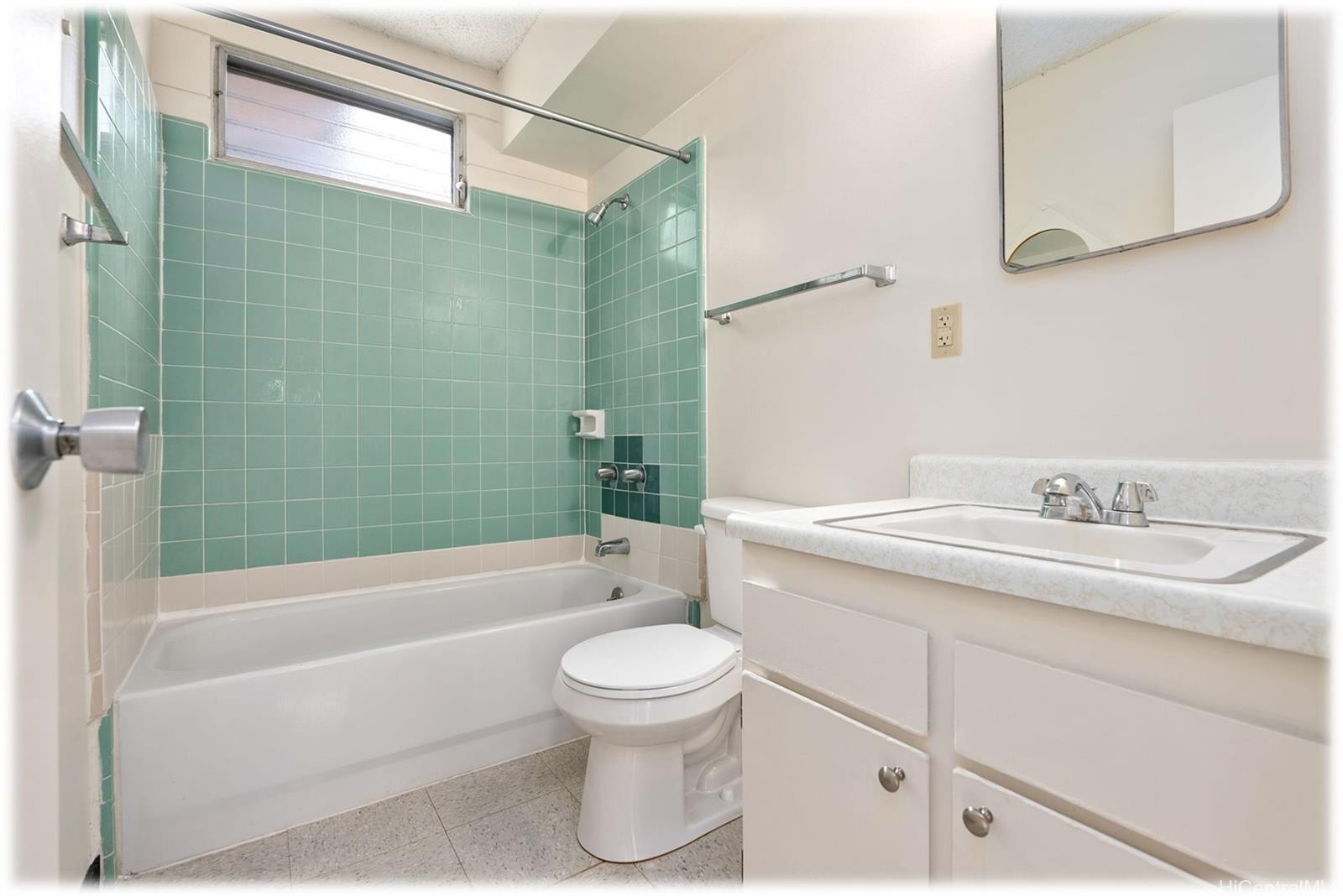 1254 Lunalilo Street Honolulu, HI 96822 - Photo 9 of 13 a bathroom with a sink toilet and shower