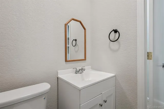 a bathroom with a sink and a toilet