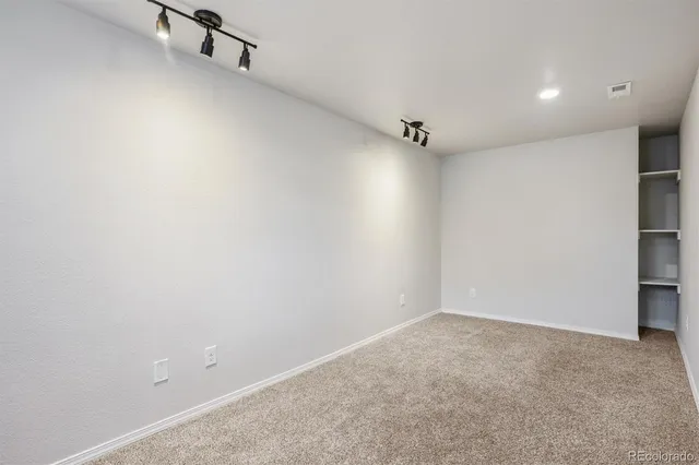 a view of a room with rack on the wall