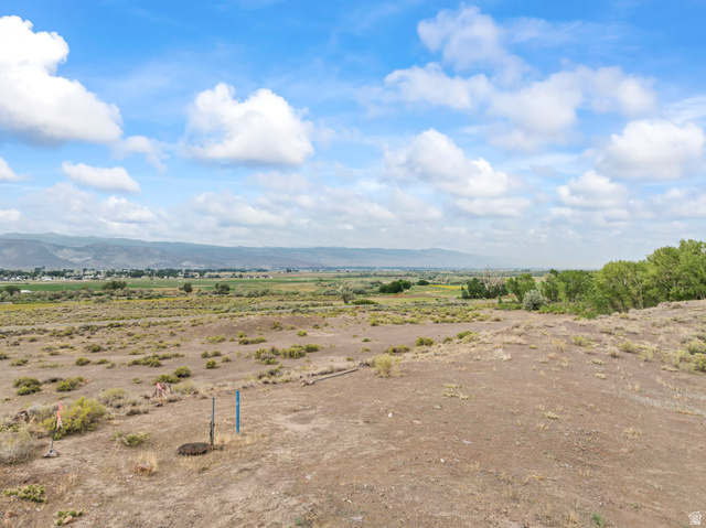 1 East Landslide Road East Monroe, UT 84754 - Photo 9 of 19 Expansive land offering broad vistas, featuring established natural vegetation and distant mountainous terrain