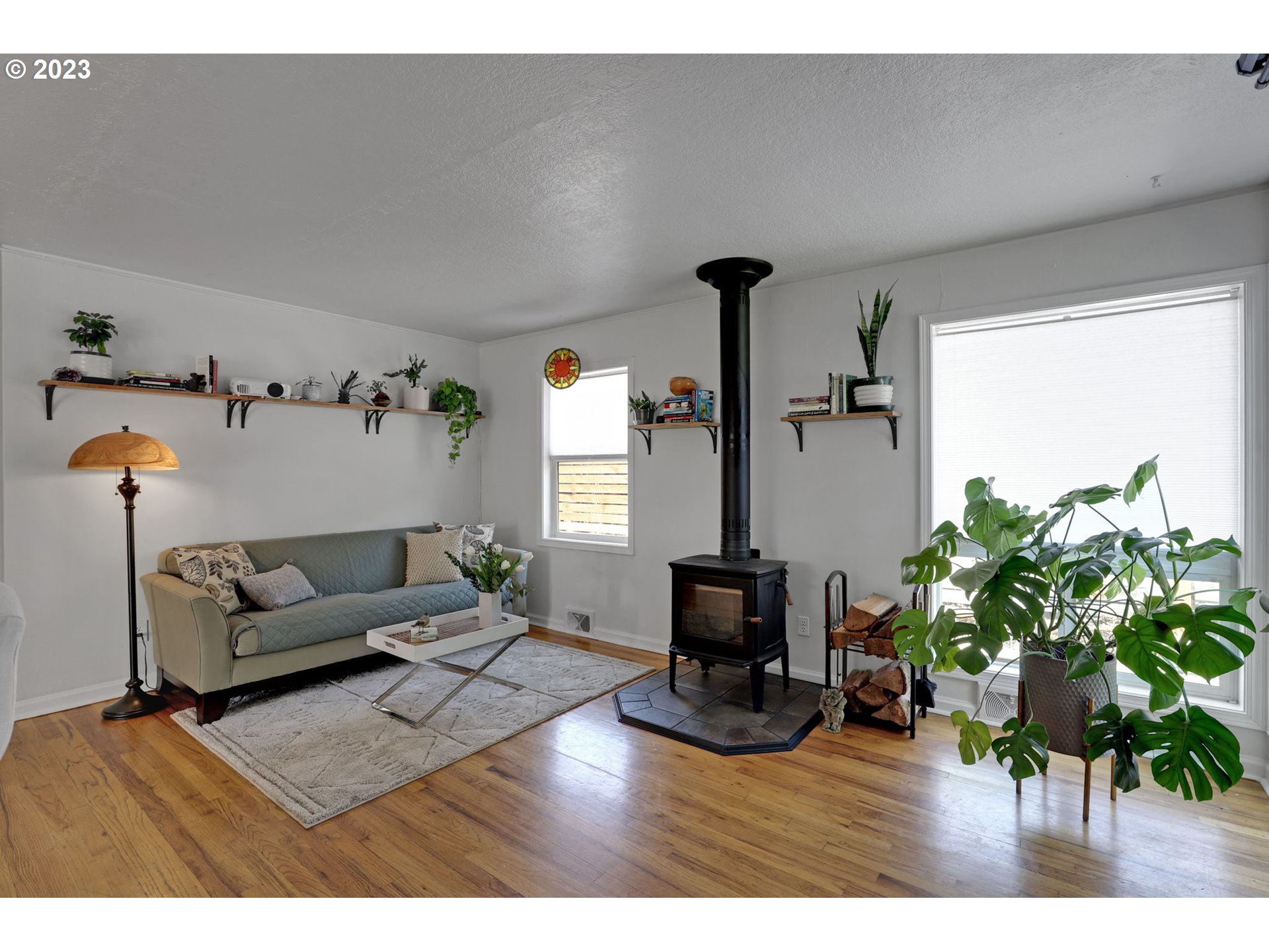 3608 Southeast Center Street Portland, OR 97202 - Photo 14 of 27 a living room with furniture and a flat screen tv