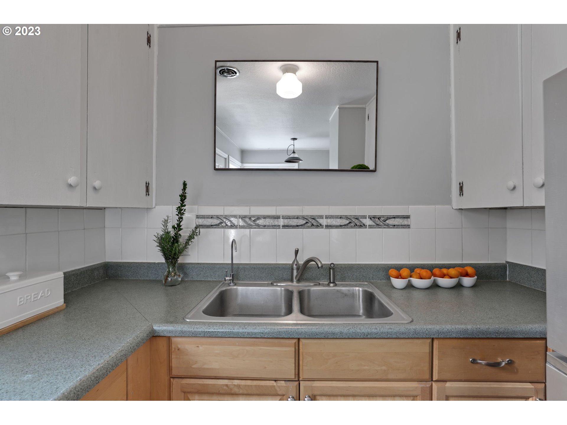 3608 Southeast Center Street Portland, OR 97202 - Photo 18 of 27 a kitchen with a sink and cabinets