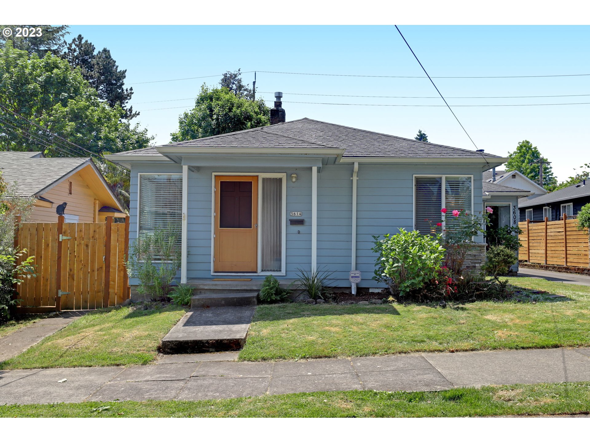 3608 Southeast Center Street Portland, OR 97202 - Photo 2 of 27 a front view of house with a yard