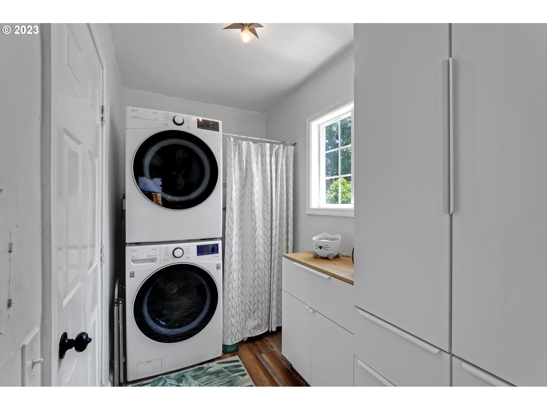 3608 Southeast Center Street Portland, OR 97202 - Photo 24 of 27 a view of a kitchen with washer and dryer