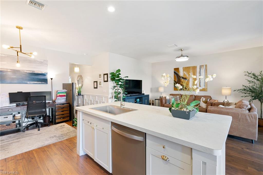 21445 Knighton Run Estero, FL 33928 - Photo 48 of 48 a view of a living room and dining room