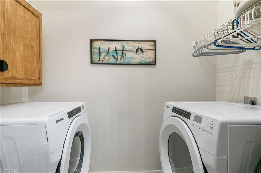 21445 Knighton Run Estero, FL 33928 - Photo 21 of 48 a utility room with dryer and washer