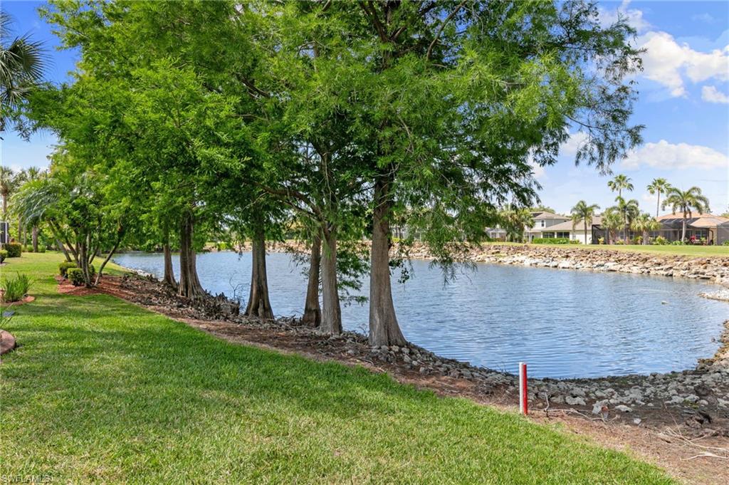 21445 Knighton Run Estero, FL 33928 - Photo 36 of 48 an outdoor space with garden view