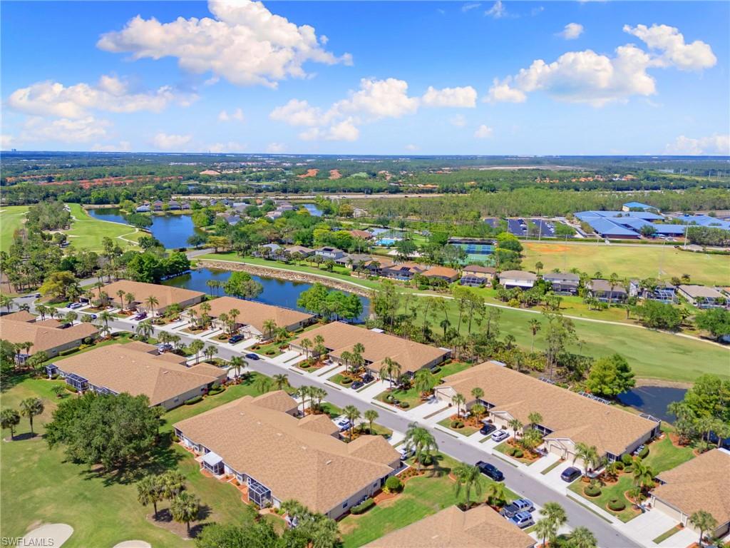 21445 Knighton Run Estero, FL 33928 - Photo 43 of 48 an aerial view of a city with lake view