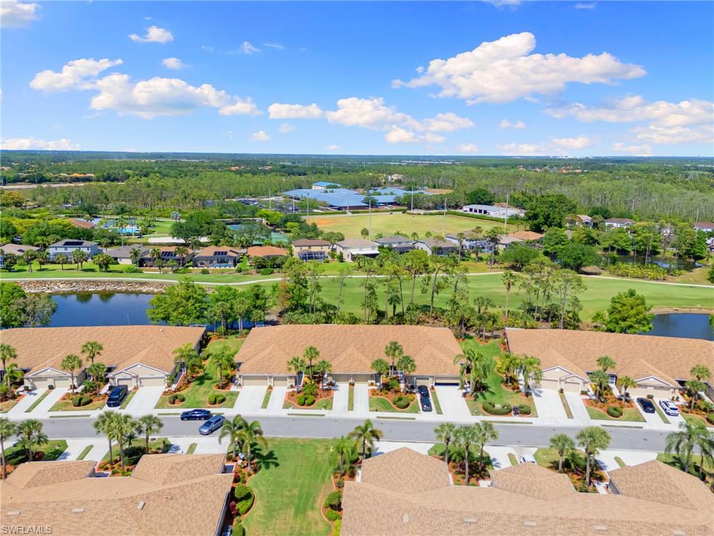 21445 Knighton Run Estero, FL 33928 - Photo 44 of 48 an aerial view of a house with a garden