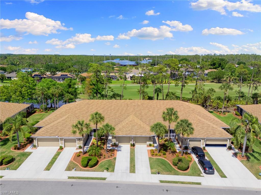 21445 Knighton Run Estero, FL 33928 - Photo 46 of 48 an aerial view of a house with garden space and street view
