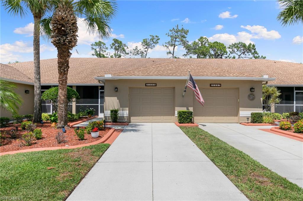 21445 Knighton Run Estero, FL 33928 - Photo 47 of 48 a front view of a house with patio