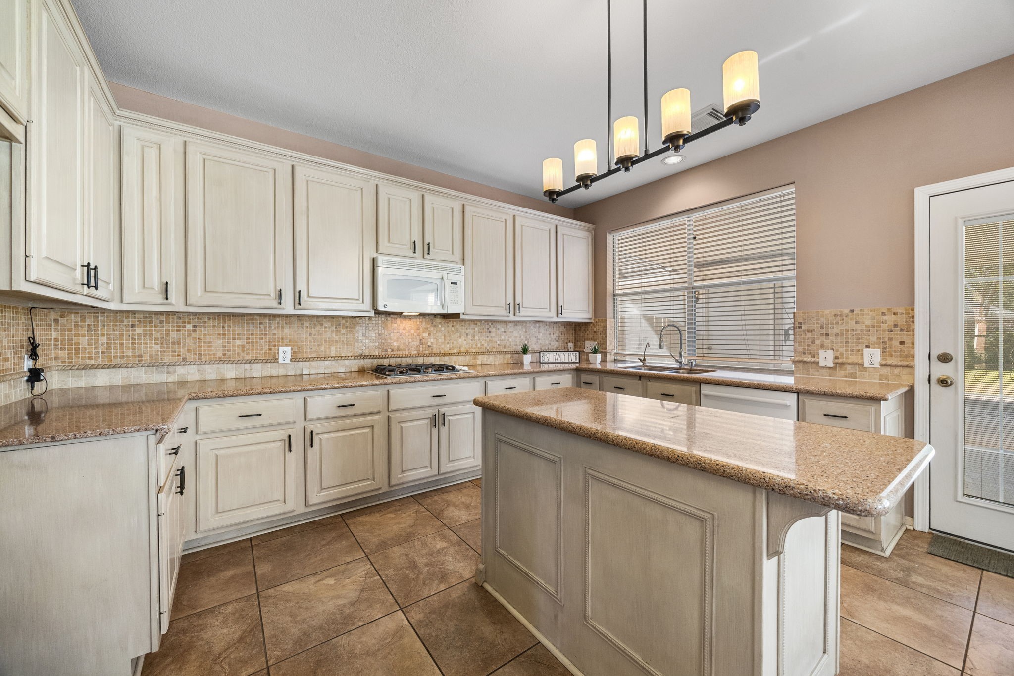 20407 Spring Rose Drive Katy, TX 77450 - Photo 14 of 33 here's another angle of the kitchen showcasing all of the storage space!