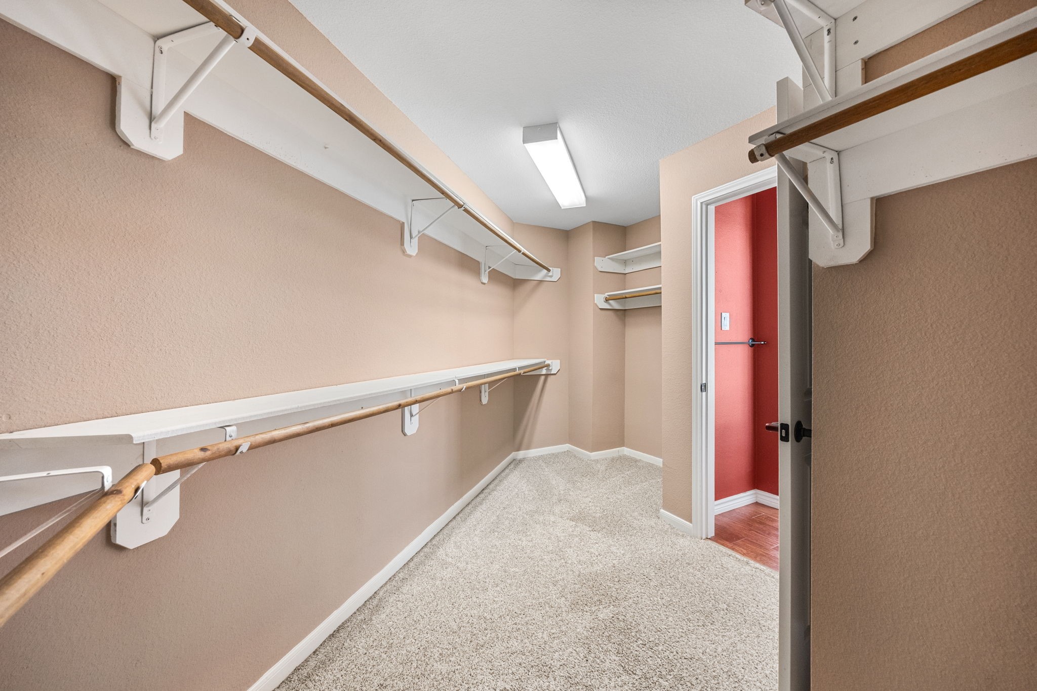 20407 Spring Rose Drive Katy, TX 77450 - Photo 24 of 33 The huge walk-in closet offers ample space for clothing and accessories, making organization effortless.