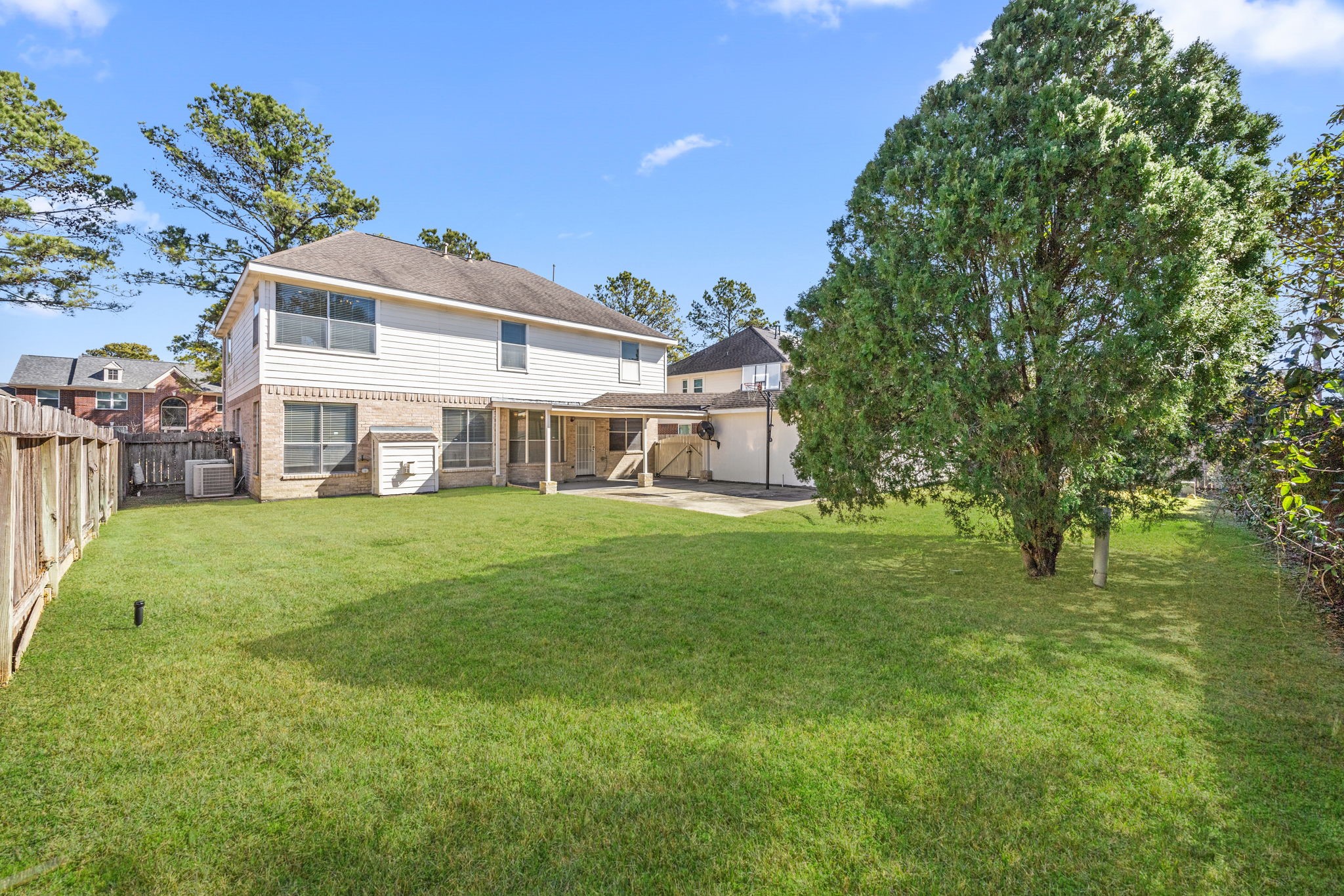 20407 Spring Rose Drive Katy, TX 77450 - Photo 33 of 33 Here's another angle of the large backyard. This is a gorgeous home and nice outdoor space to call your own! Welcome home!