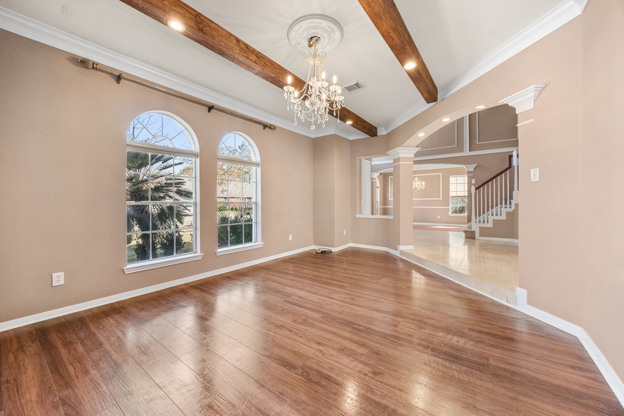 20407 Spring Rose Drive Katy, TX 77450 - Photo 9 of 33 From this angle of the versatile space, you see toward the grand staircase and front entryway.