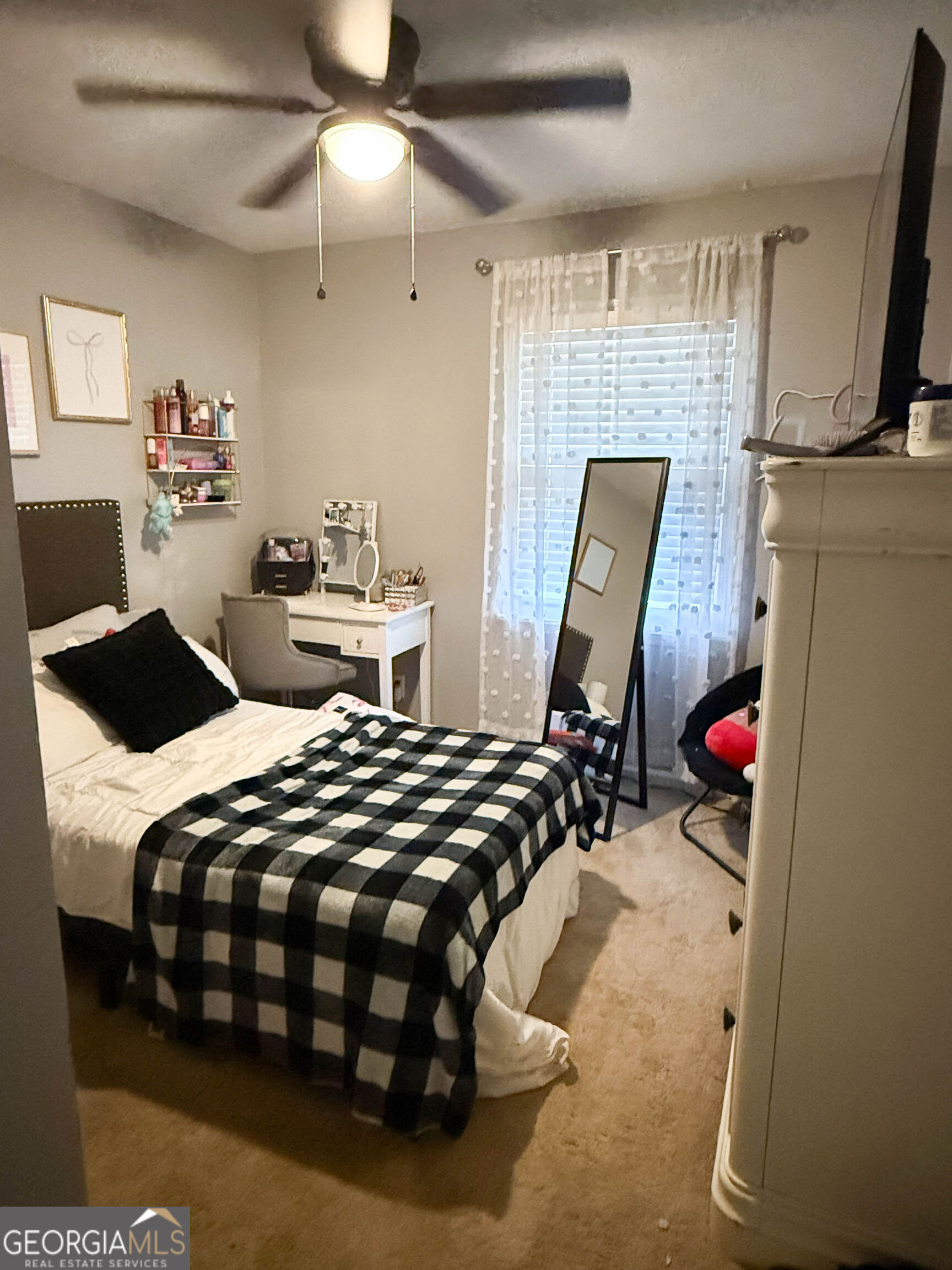 1508 Cloverdale Road Anniston, AL 36207 - Photo 12 of 19 a bedroom with bed and wooden floor