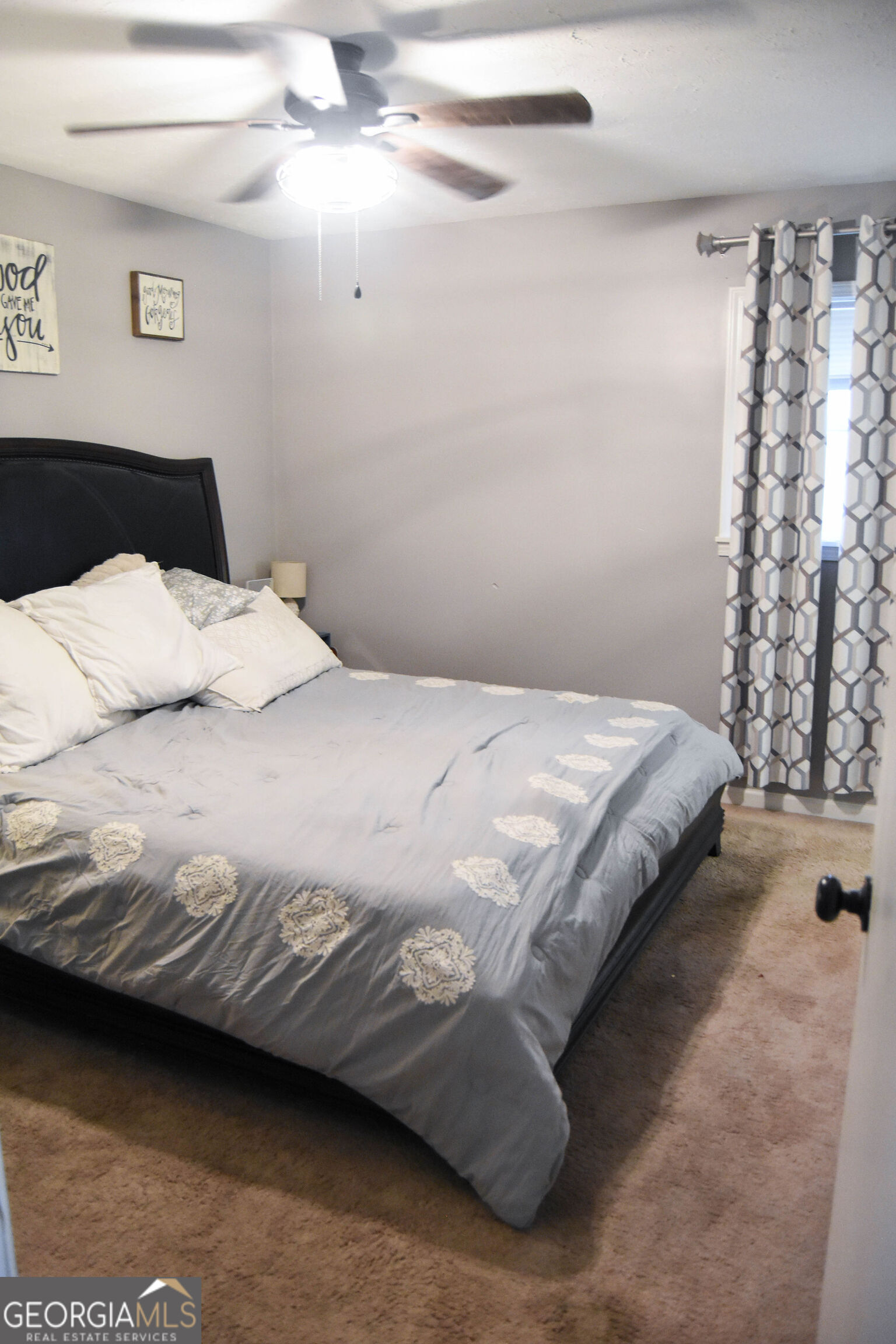 1508 Cloverdale Road Anniston, AL 36207 - Photo 15 of 19 a bedroom with a bed and a window