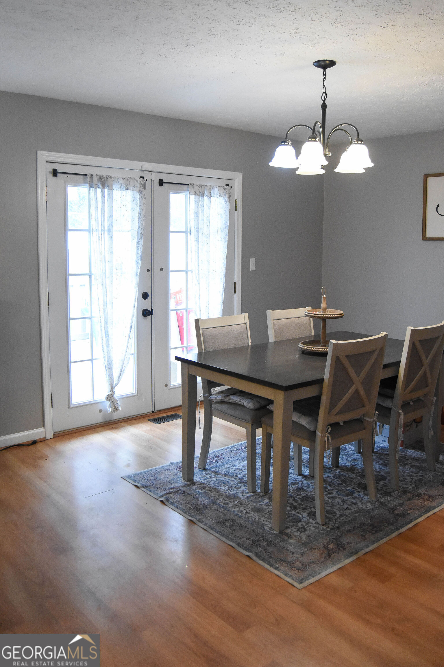 1508 Cloverdale Road Anniston, AL 36207 - Photo 5 of 19 a workspace with furniture window and wooden floor