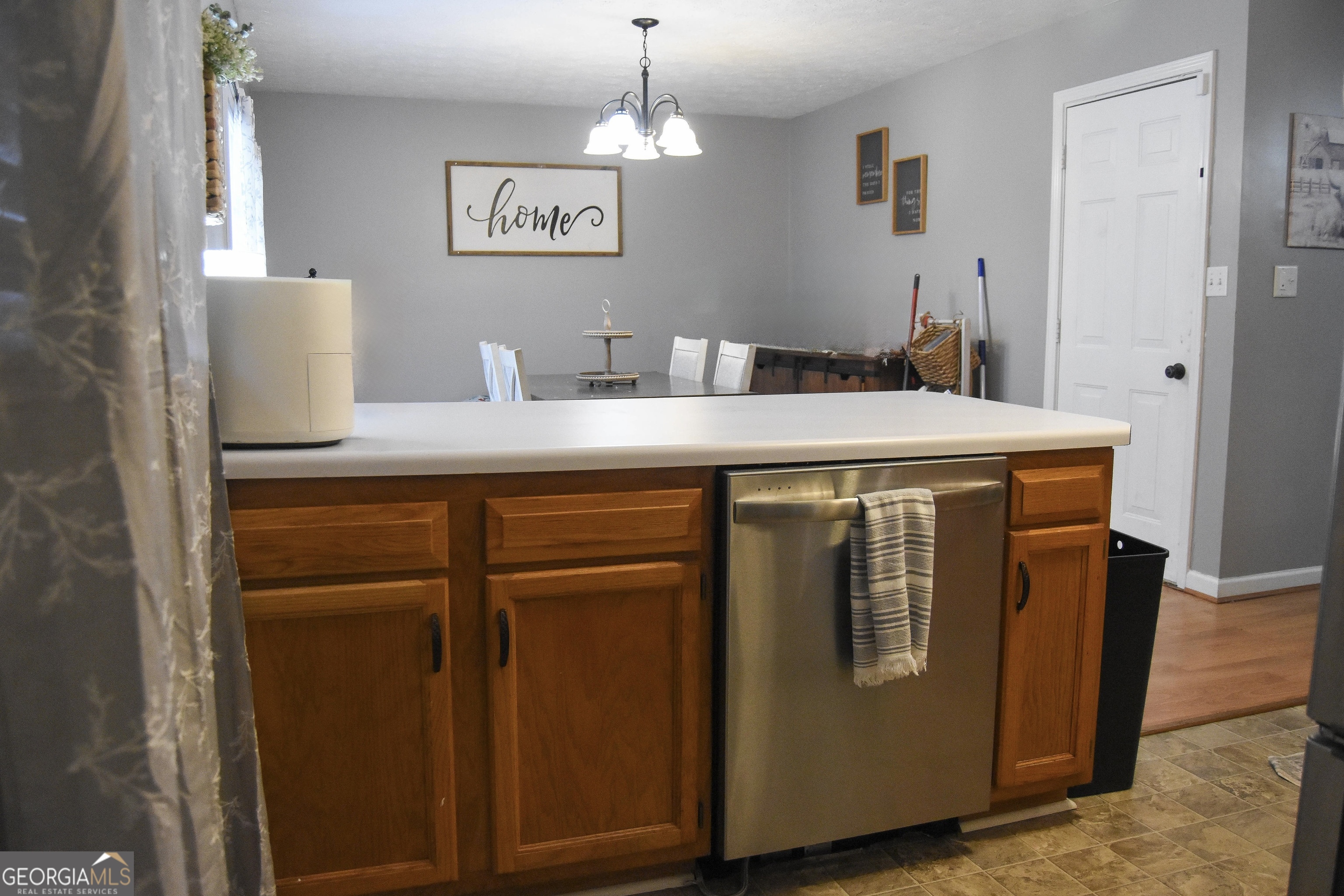 1508 Cloverdale Road Anniston, AL 36207 - Photo 8 of 19 a room with cabinets and wooden floor