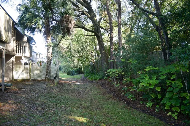 a view of balcony with small garden